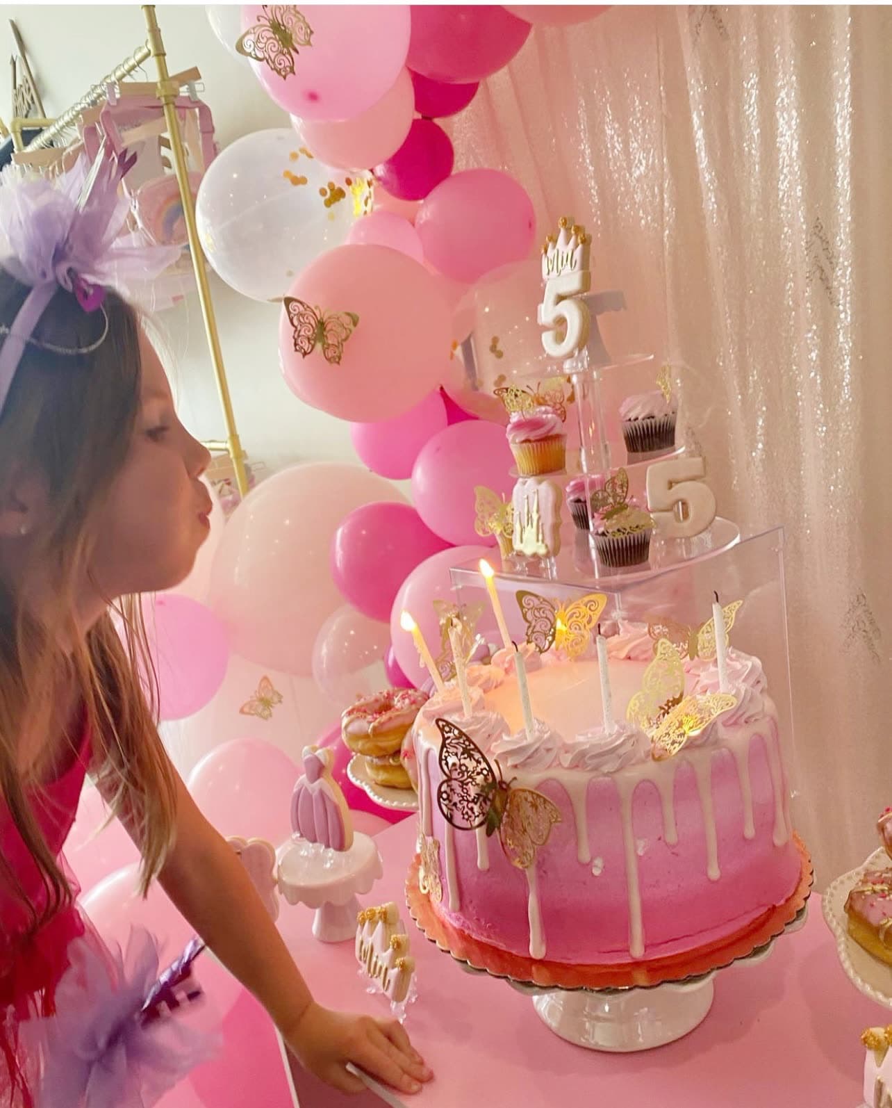 A birthday girl with her cake at Play La La