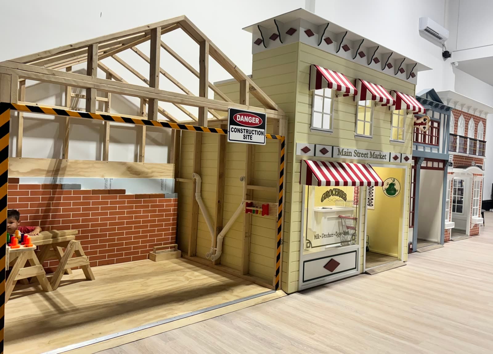 The storefronts of the Play La La village